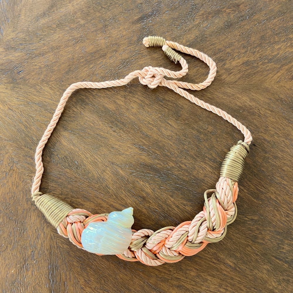 Pink woven shell belt with tie closure